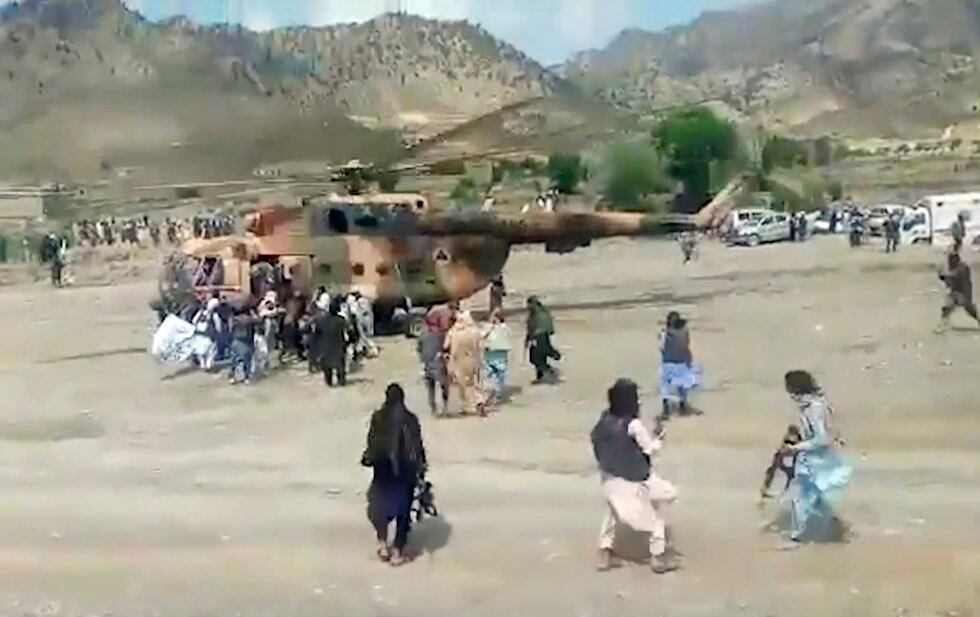 In this image taken from video from Bakhtar State News Agency, Taliban fighters secure a...