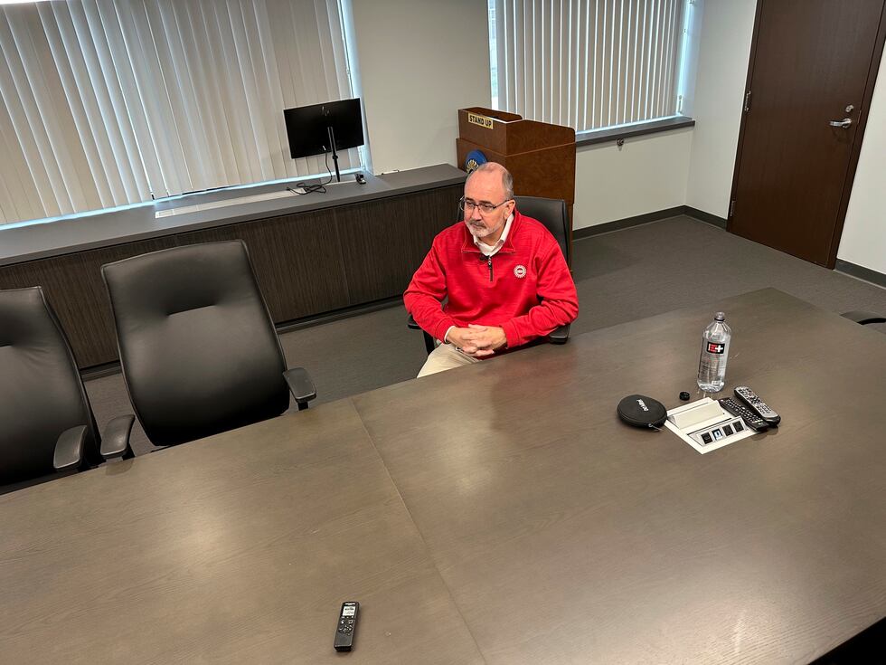 United Auto Workers President Shawn Fain speaks to a reporter from The Associated Press during...