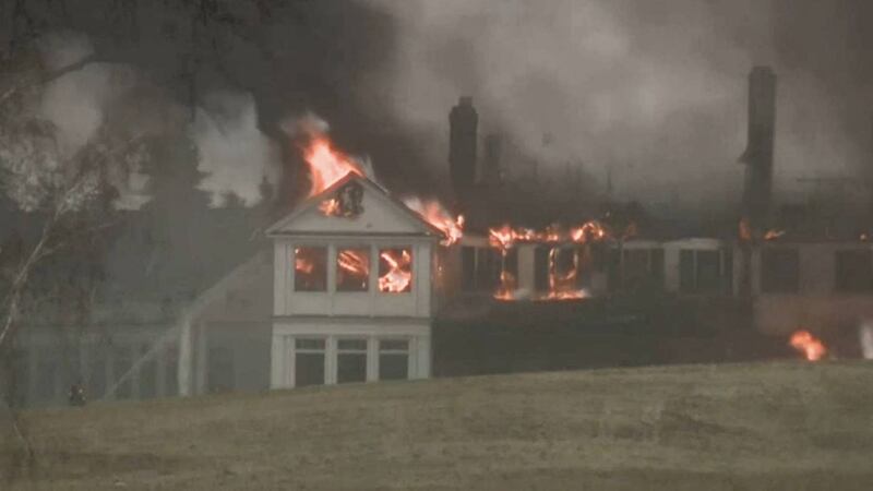 Fire crews battle a fire at the Oakland Hills Country Club on Feb. 17, 2022.