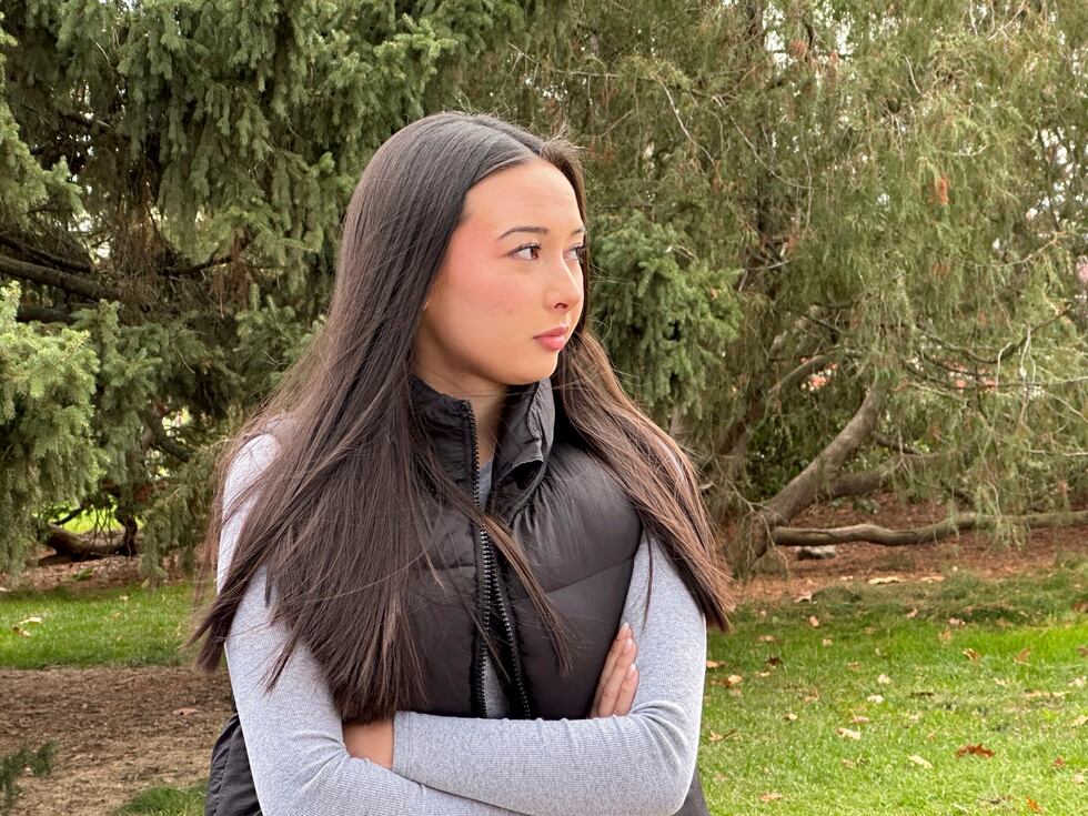 Kylie Ossege stands near The Rock on the campus of Michigan State University Friday, Nov. 10,...