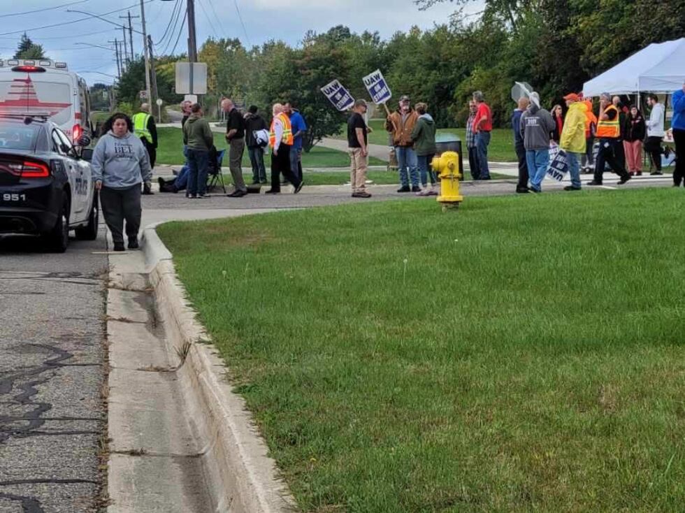 UAW strikers hit by vehicle.
