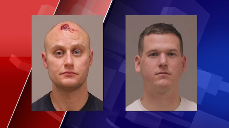 The two officers are under investigation by their own department after a bar fight that...